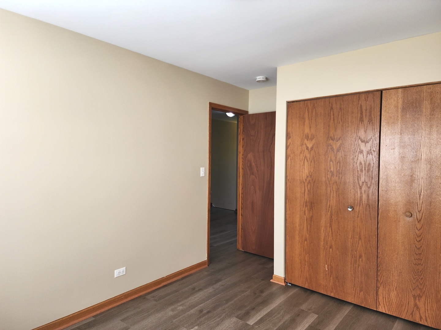775 Highview Court Antioch, IL 60002 - Photo 14 of 16 an empty room with wooden floor and closet area