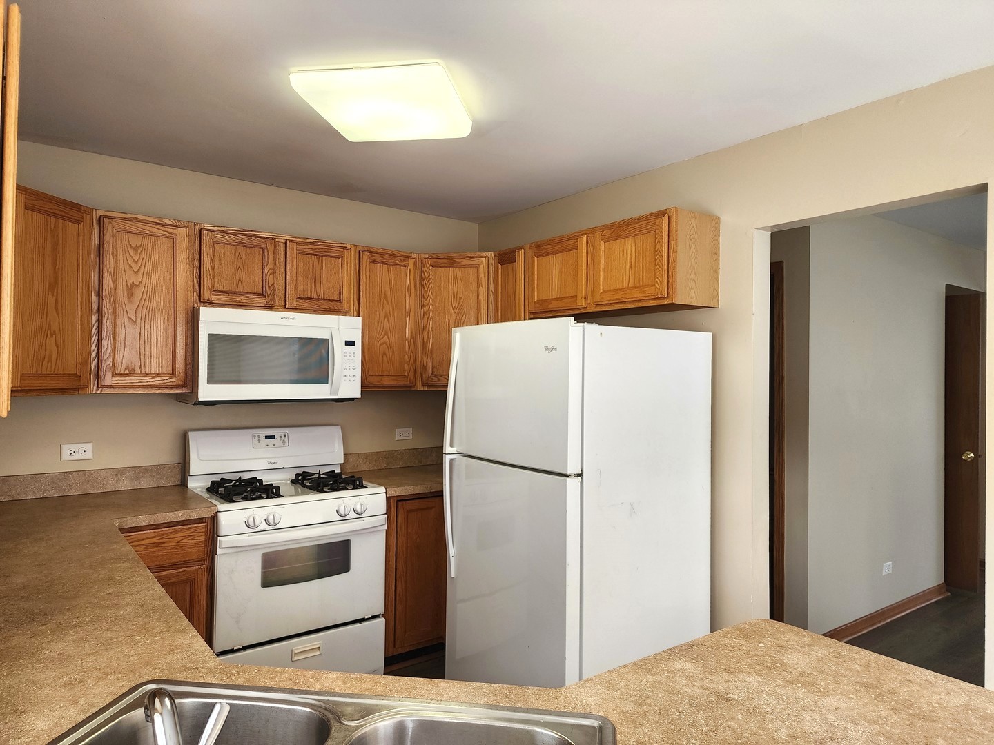 775 Highview Court Antioch, IL 60002 - Photo 8 of 16 a kitchen with a refrigerator stove and microwave