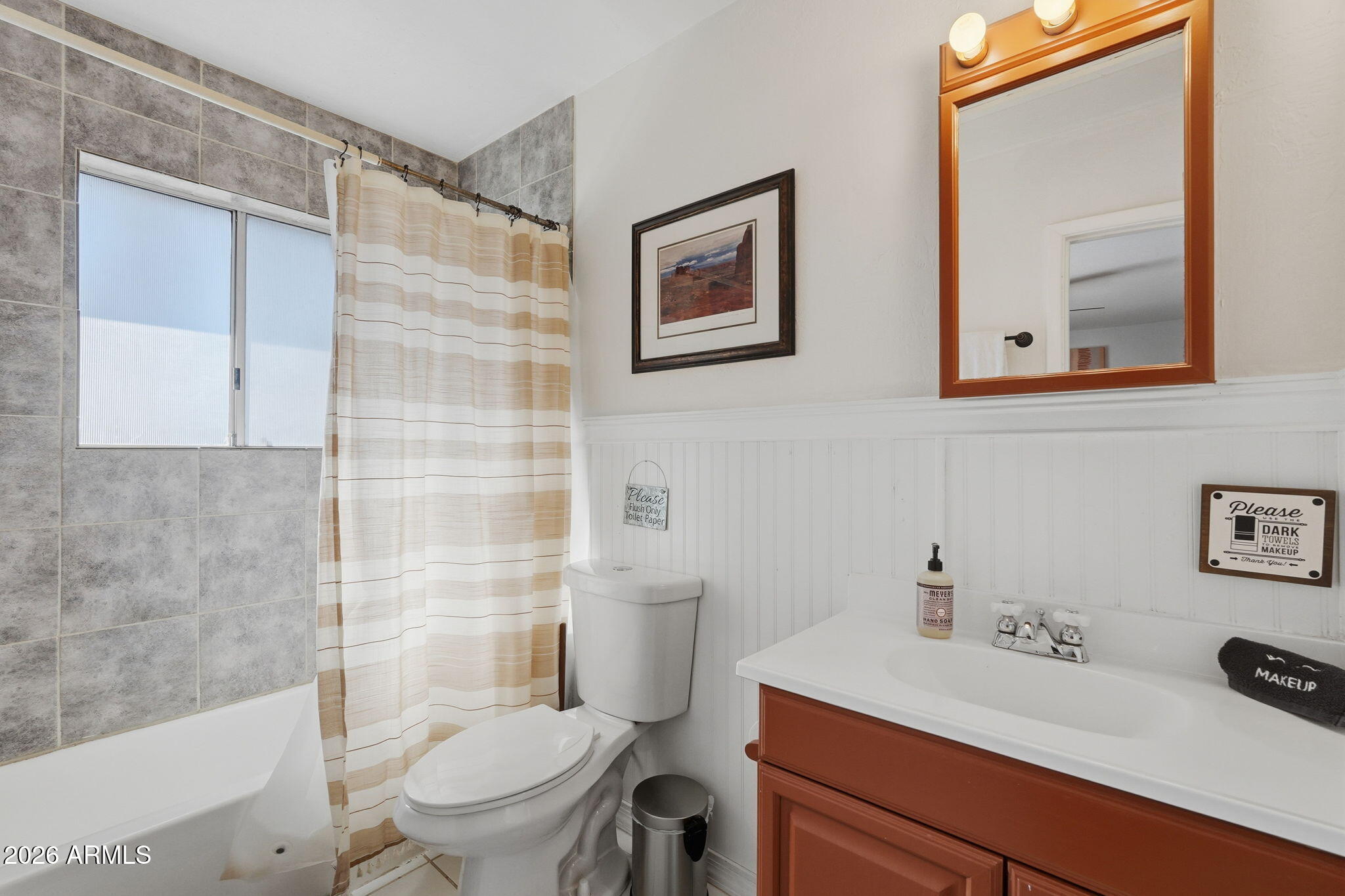 8247 Ralls Drive Pine, AZ 85544 - Photo 21 of 50 a bathroom with a sink a toilet and a mirror