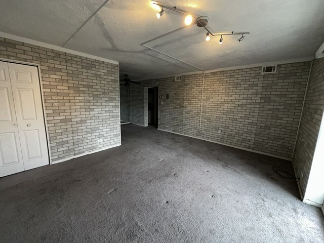 17005 Albany Avenue, Unit 102 Hazel Crest, IL 60429 - Photo 4 of 13 a view of a garage