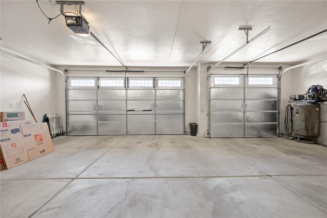 3319 Motherload Road Kingman, AZ 86401 - Photo 29 of 53 Spacious 3 car, boat deep garage featuring natural lighting
