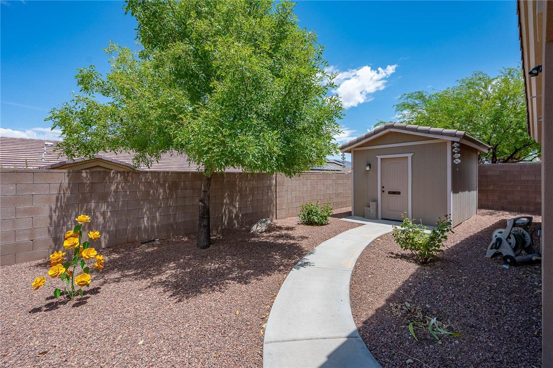 3319 Motherload Road Kingman, AZ 86401 - Photo 39 of 53 Completely fenced backyard, mature landscaping and a shed