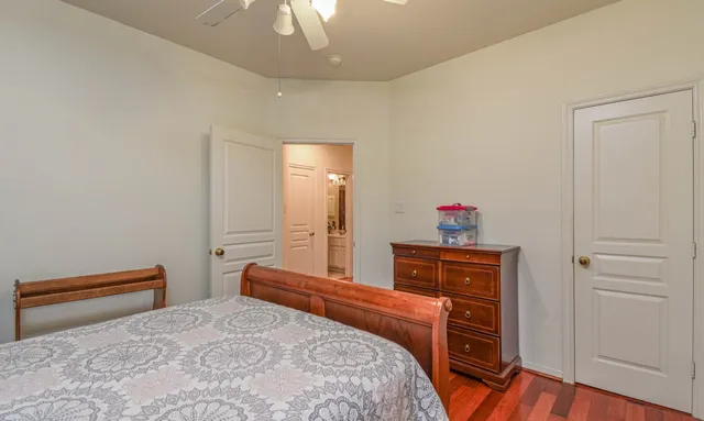a bathroom with a sink vanity and a mirror
