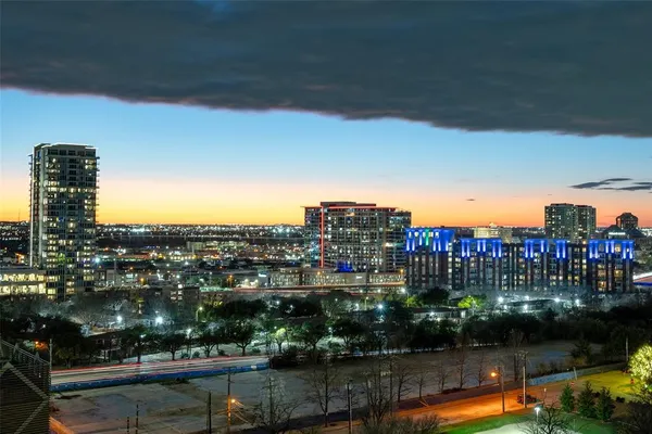 a view of a lake with a city
