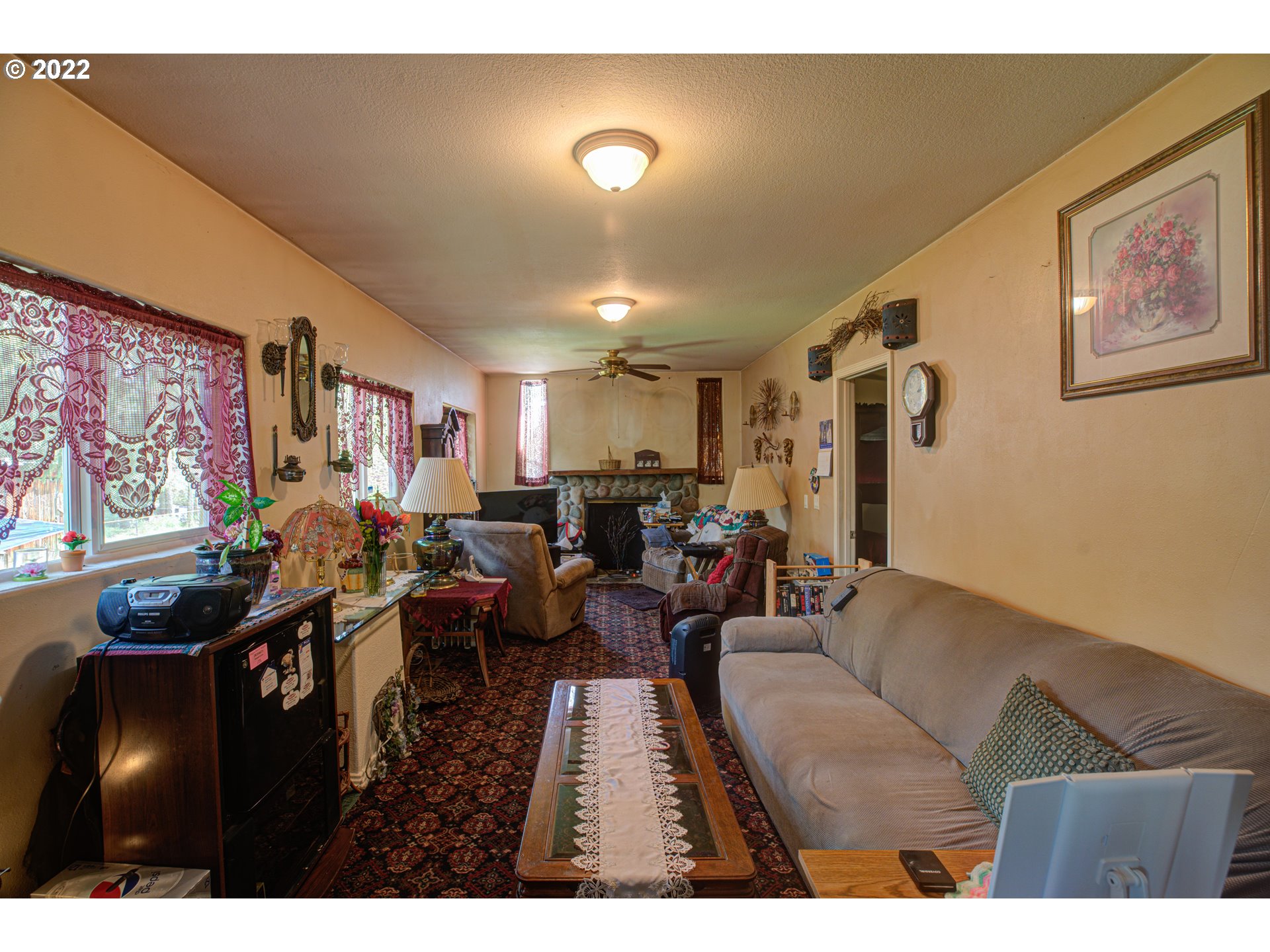 29223 South Hult Road Colton, OR 97017 - Photo 22 of 30 a living room with furniture and a flat screen tv