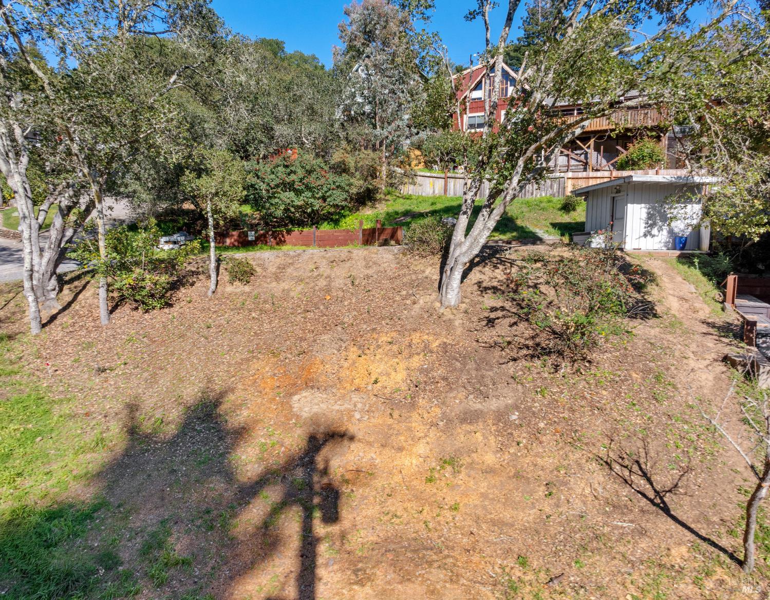 320 Tennessee Avenue Mill Valley, CA 94941 - Photo 2 of 7 a front view of a house with a yard