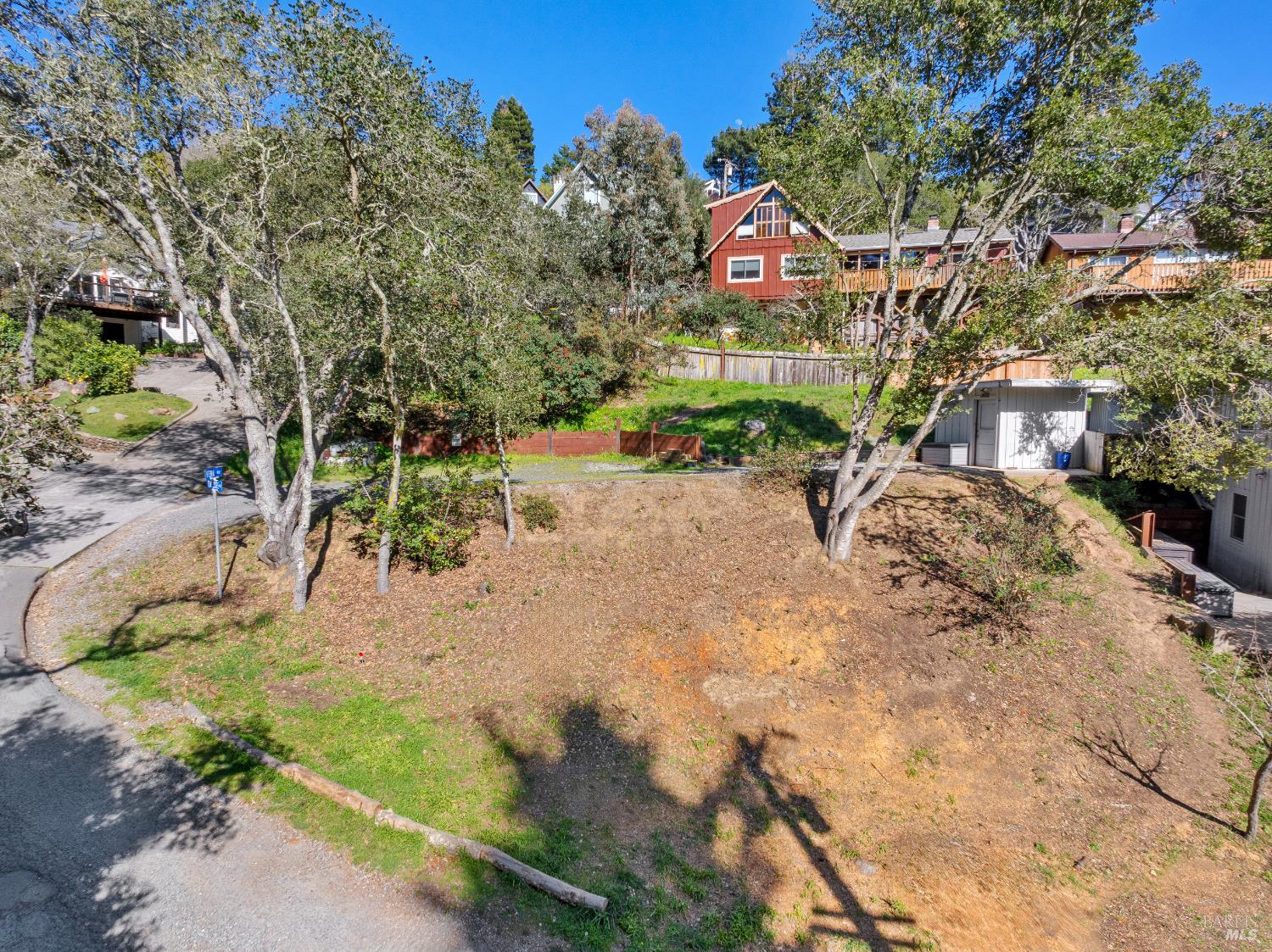 320 Tennessee Avenue Mill Valley, CA 94941 - Photo 3 of 7 a front view of a house with a yard and garage