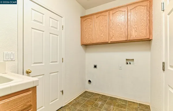 a utility room with a sink