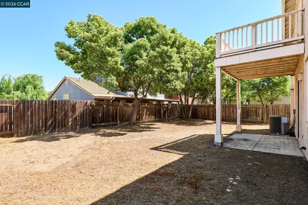 a view of a house with a snow in the background