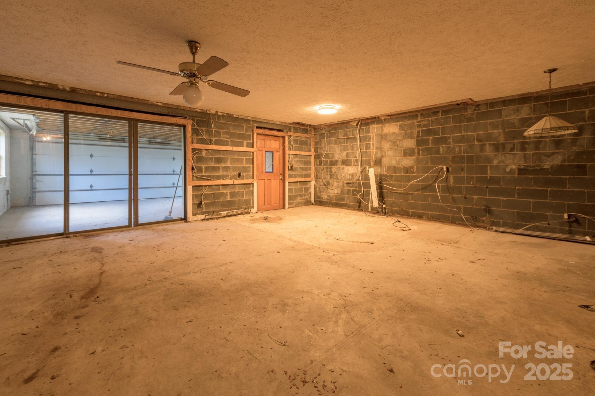 184 Buff Ridge Road Boone, NC 28607 - Photo 23 of 42 a view of an empty room with a cabinet