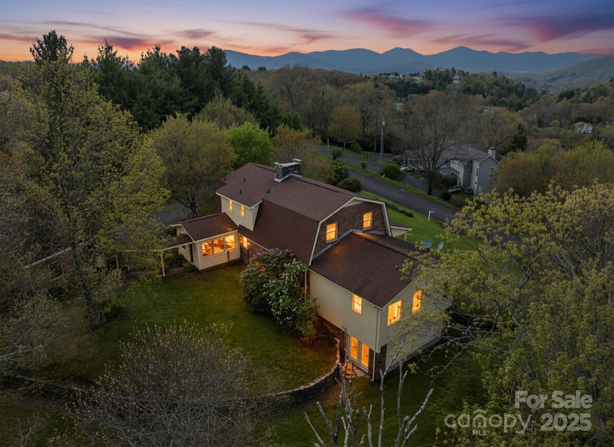 184 Buff Ridge Road Boone, NC 28607 - Photo 27 of 42 an aerial view of a house with a garden
