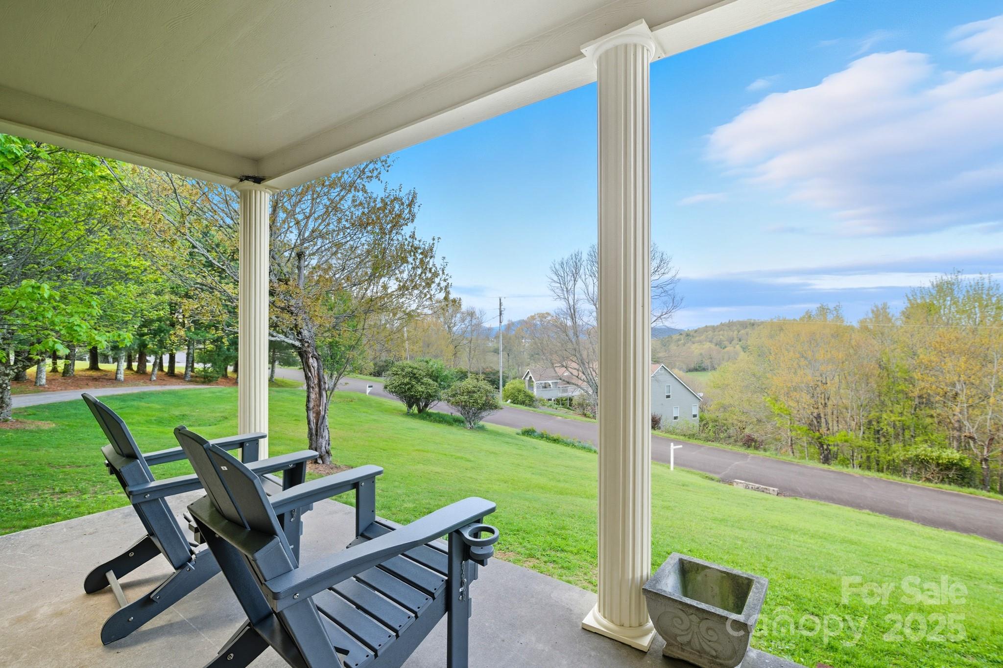 184 Buff Ridge Road Boone, NC 28607 - Photo 40 of 42 a view of a big room with porch and wooden floor
