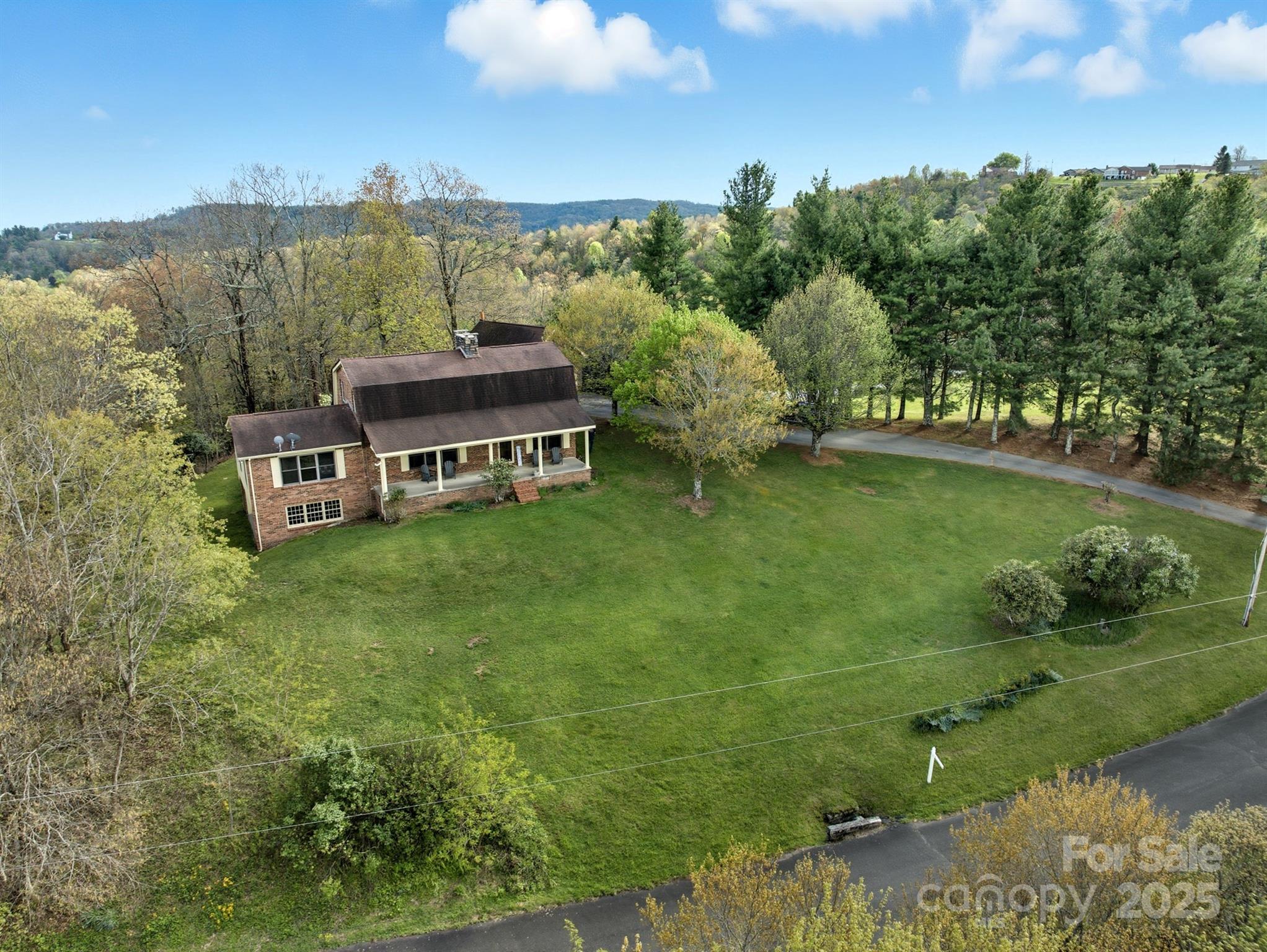 184 Buff Ridge Road Boone, NC 28607 - Photo 41 of 42 a aerial view of a house with big yard