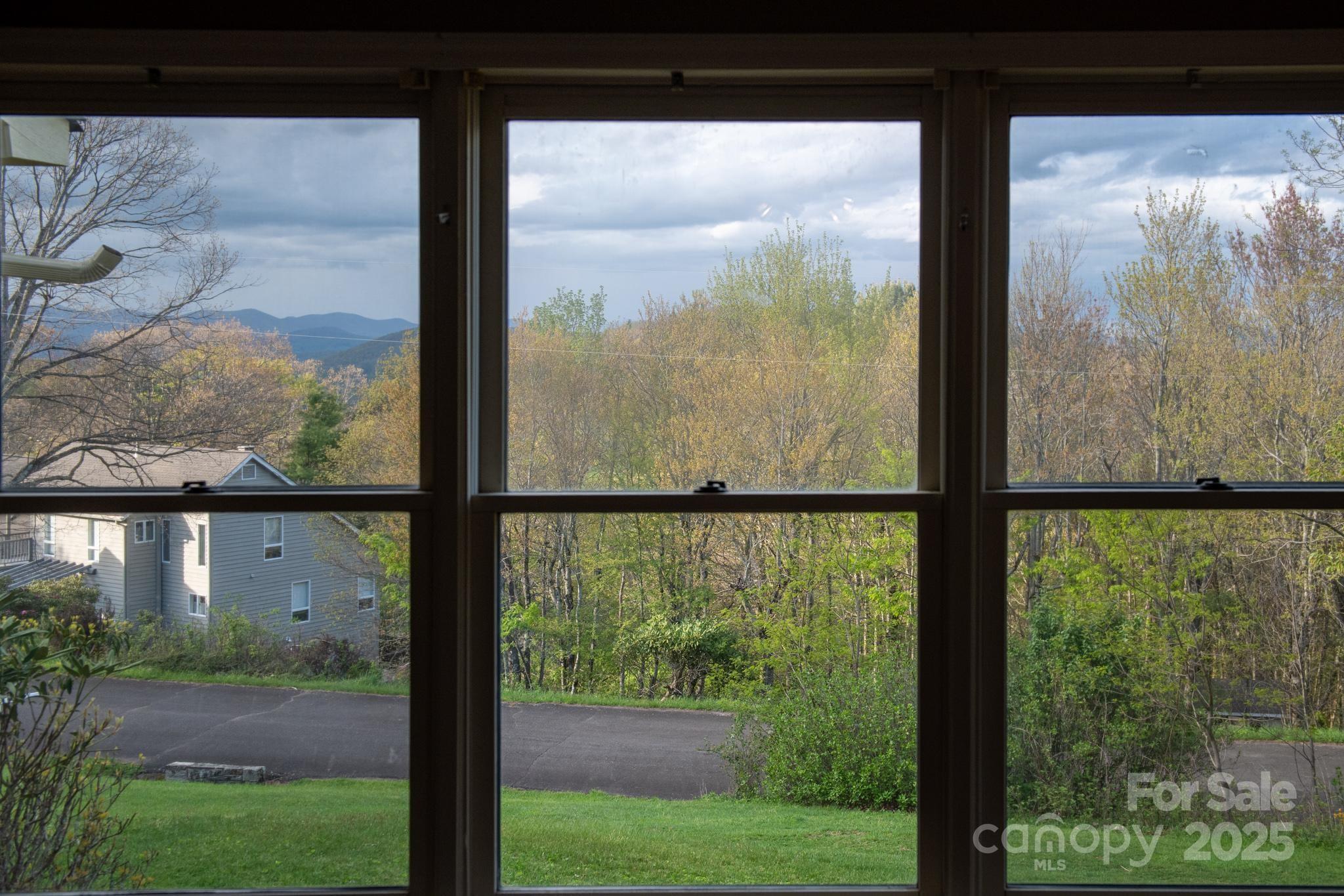 184 Buff Ridge Road Boone, NC 28607 - Photo 10 of 42 a view of a room with a large window