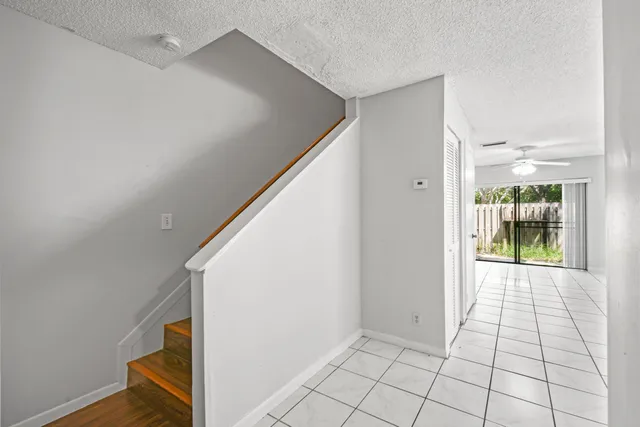 a view of an entryway with kitchen