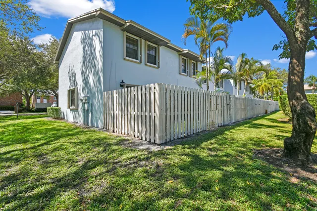 a view of a backyard with a plants