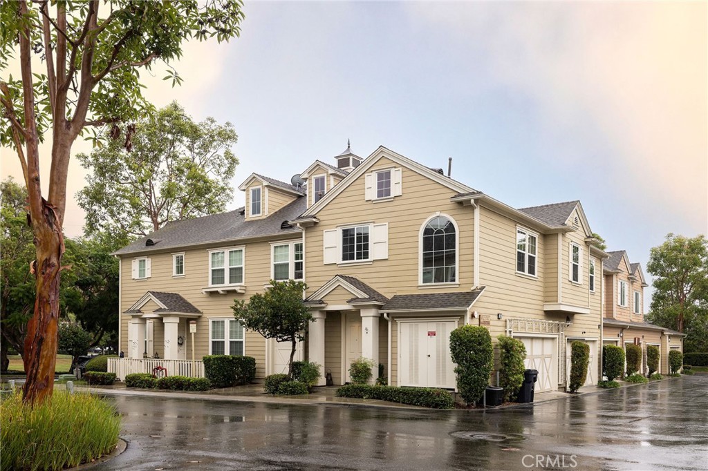 a front view of a house with windows yard