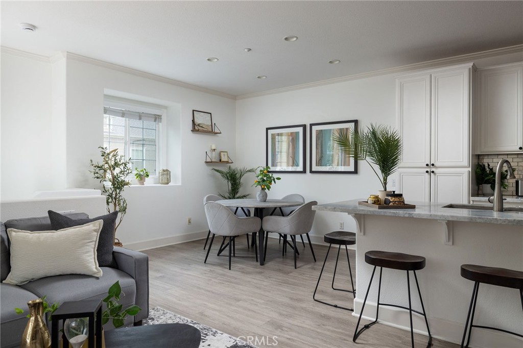 34 Bayley Street Ladera Ranch, CA 92694 - Photo 12 of 24 a view of a dining room with furniture and window