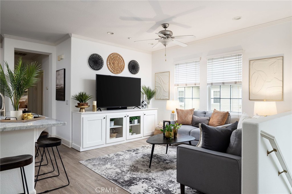 34 Bayley Street Ladera Ranch, CA 92694 - Photo 14 of 24 a living room with furniture and a flat screen tv