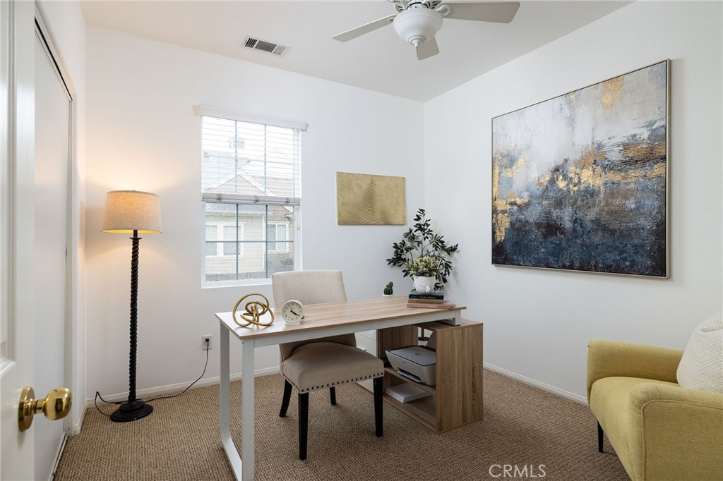 34 Bayley Street Ladera Ranch, CA 92694 - Photo 17 of 24 a view of a workspace with furniture and a window