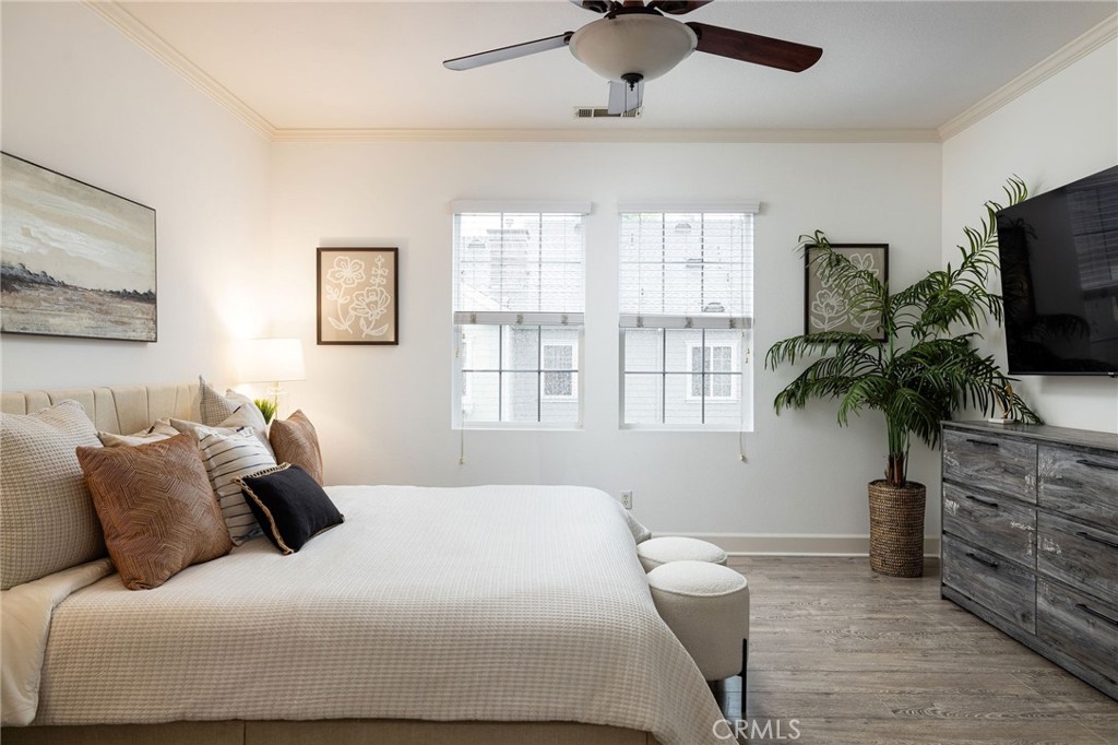 34 Bayley Street Ladera Ranch, CA 92694 - Photo 23 of 24 a bedroom with a bed and a television