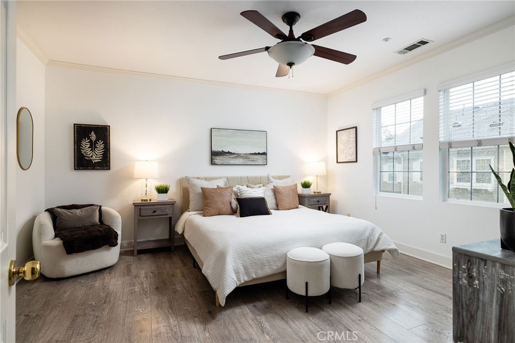 34 Bayley Street Ladera Ranch, CA 92694 - Photo 24 of 24 a bedroom with a bed and a couch