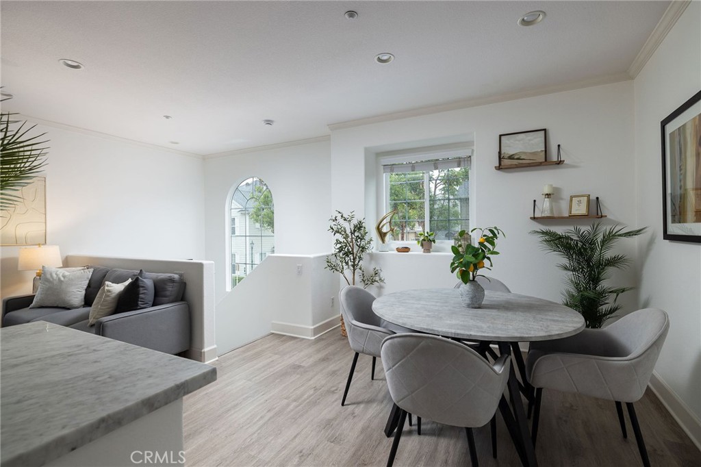 34 Bayley Street Ladera Ranch, CA 92694 - Photo 10 of 24 a view of a dining room with furniture and wooden floor