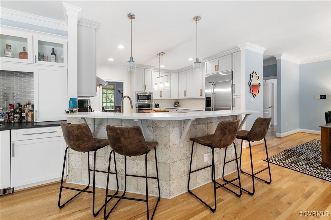 14149 Riverdowns S Drive Midlothian, VA 23113 - Photo 11 of 48 Kitchen featuring built in appliances, a breakfast