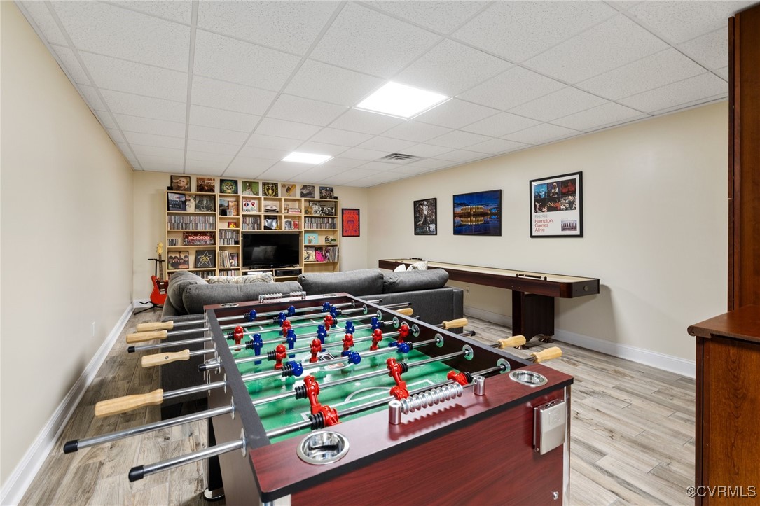 14149 Riverdowns S Drive Midlothian, VA 23113 - Photo 34 of 48 Basement Rec room with wood finished floors, baseb