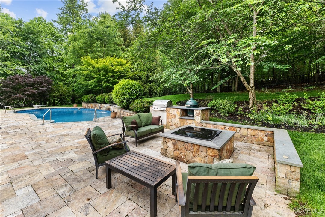 14149 Riverdowns S Drive Midlothian, VA 23113 - Photo 46 of 48 View of patio featuring an outdoor kitchen, an out