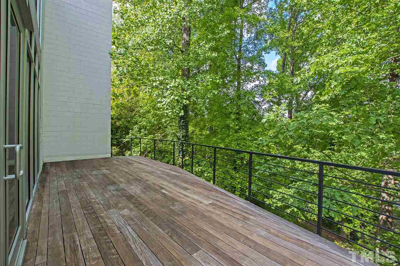 1825 Stillwater Drive Raleigh, NC 27607 - Photo 17 of 22 a view of balcony with wooden floor