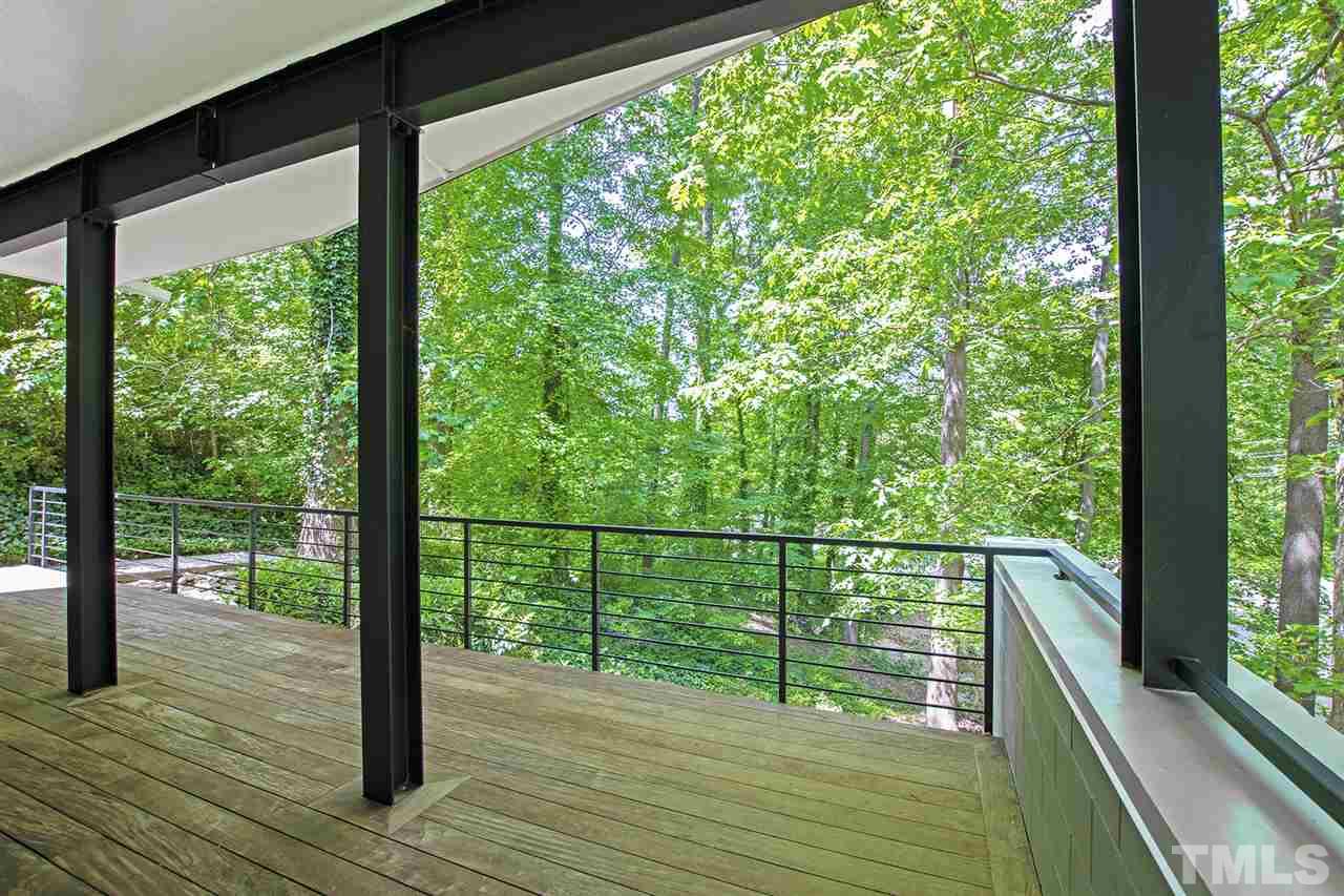 1825 Stillwater Drive Raleigh, NC 27607 - Photo 18 of 22 a view of a balcony with wooden floor