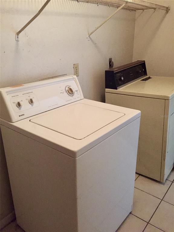 3234 Southwest 25th Drive Gainesville, FL 32608 - Photo 6 of 6 a utility room with dryer and washer