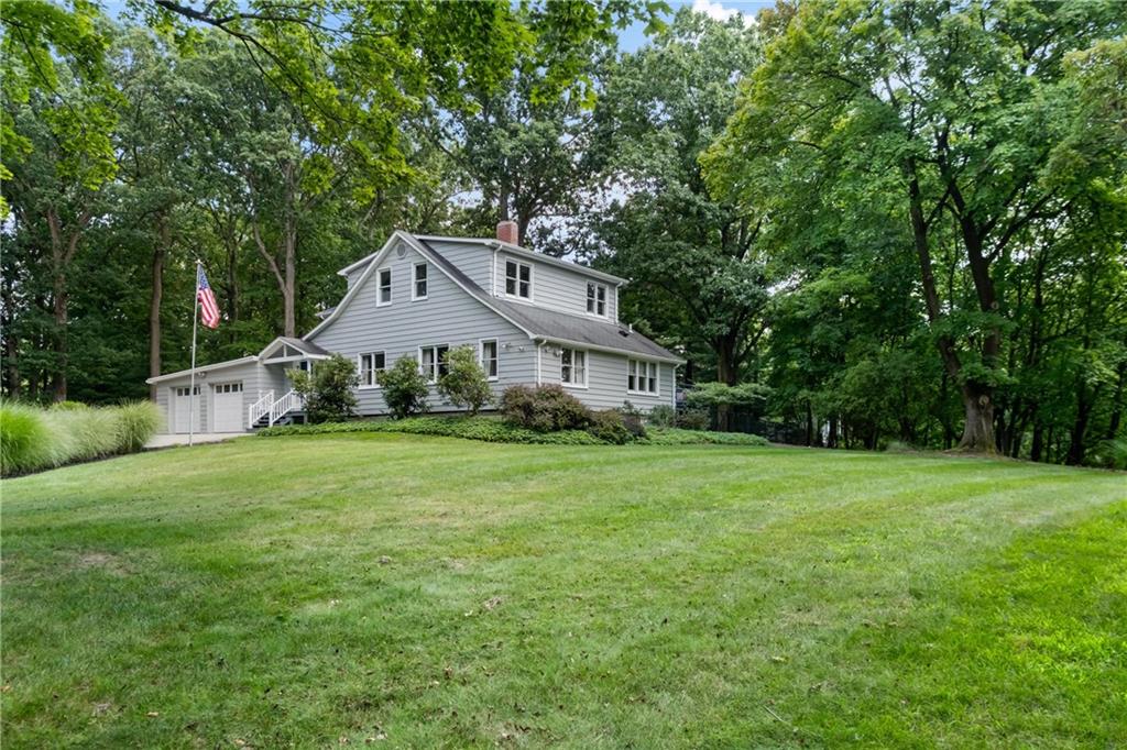9550 Harding Road Pittsburgh, PA 15237 - Photo 2 of 44 a front view of a house with a yard and trees