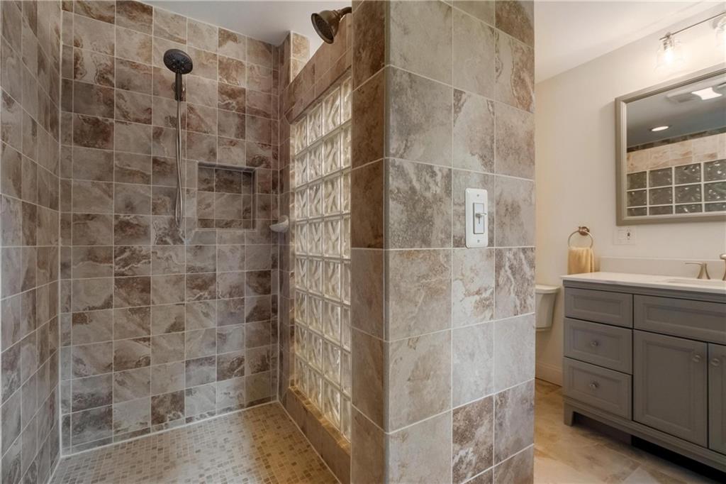 9550 Harding Road Pittsburgh, PA 15237 - Photo 27 of 44 a bathroom with a shower and a sink