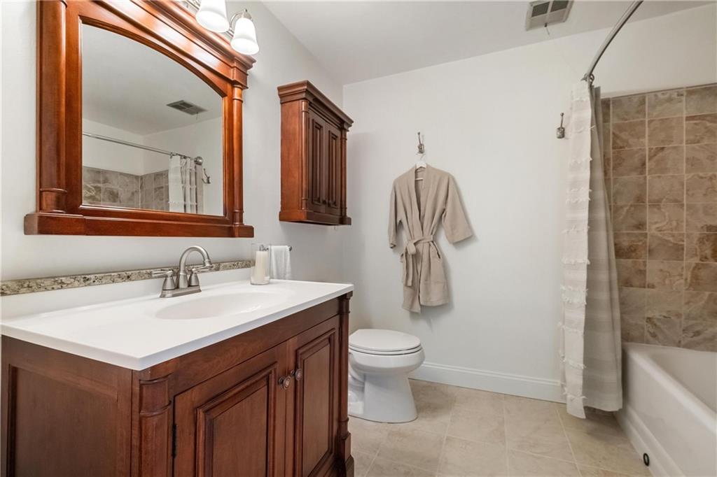 9550 Harding Road Pittsburgh, PA 15237 - Photo 30 of 44 a bathroom with a sink toilet and shower