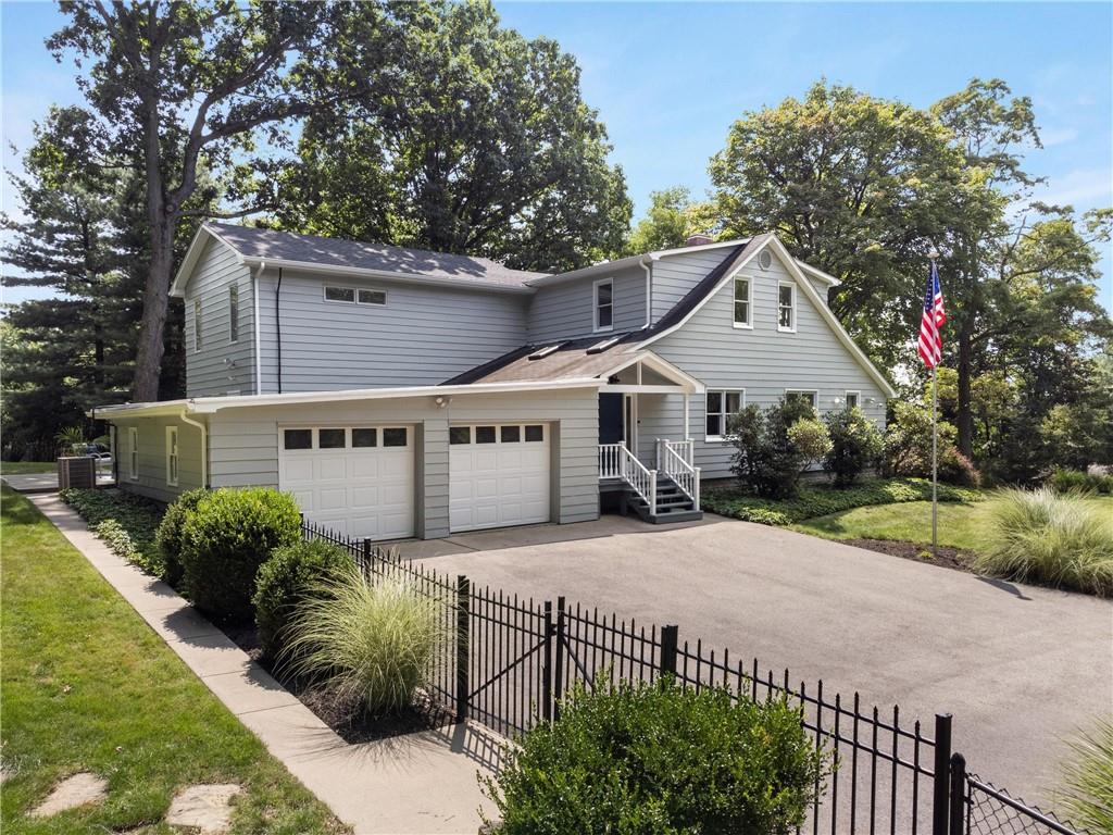 9550 Harding Road Pittsburgh, PA 15237 - Photo 41 of 44 a view of a house with wooden fence