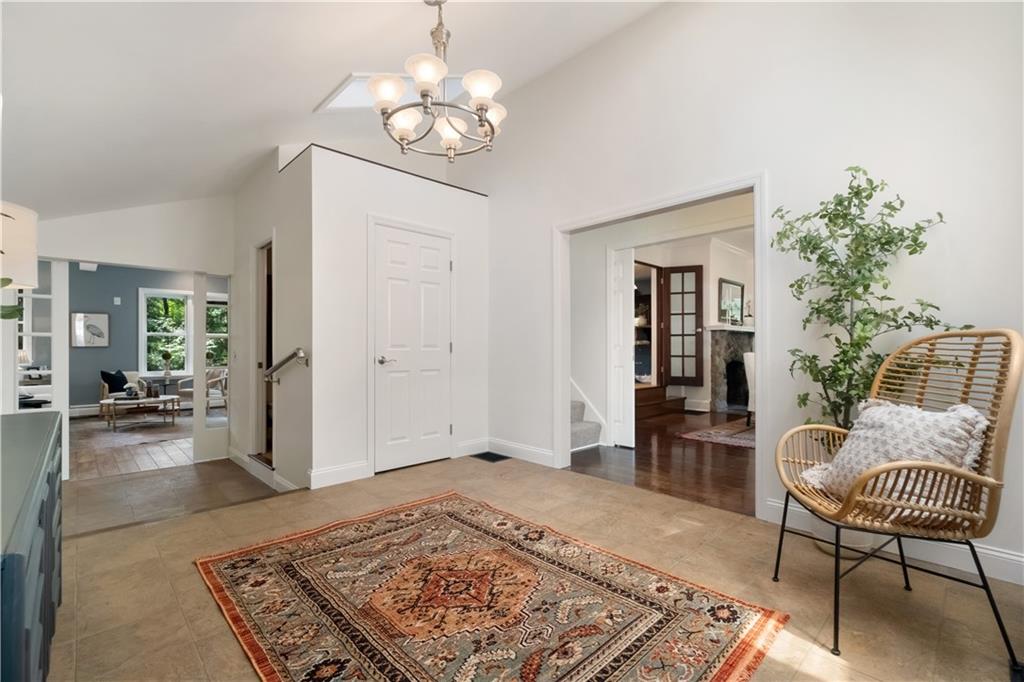 9550 Harding Road Pittsburgh, PA 15237 - Photo 6 of 44 a living room with furniture and a potted plant