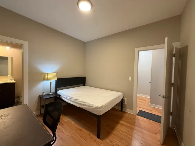 a room with a bed and a table