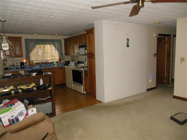 7 Dondi Road Beverly, MA 01915 - Photo 3 of 22 a kitchen with stainless steel appliances granite countertop a stove and a refrigerator