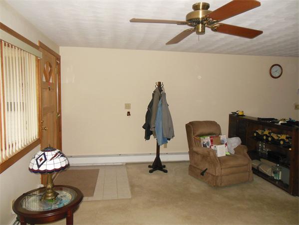 7 Dondi Road Beverly, MA 01915 - Photo 5 of 22 a room with gym equipment