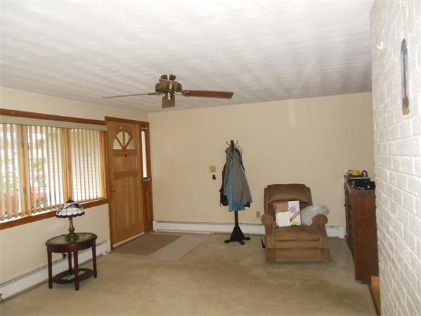 7 Dondi Road Beverly, MA 01915 - Photo 6 of 22 a view of a room with gym equipment