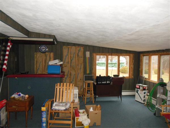 7 Dondi Road Beverly, MA 01915 - Photo 8 of 22 a living room with furniture and a window