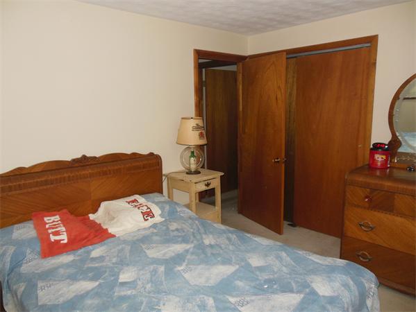 7 Dondi Road Beverly, MA 01915 - Photo 10 of 22 a bedroom with a bed and a dresser