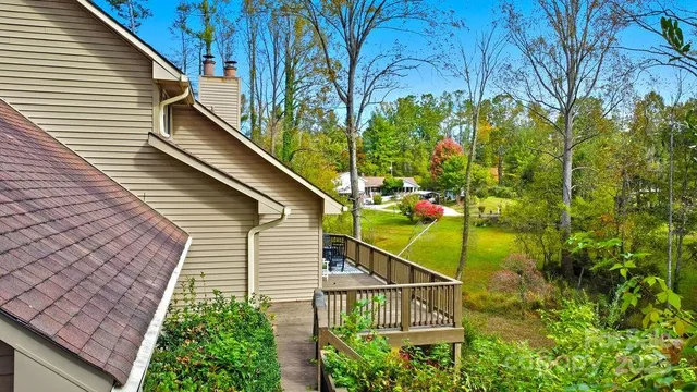 a view of a backyard with plants