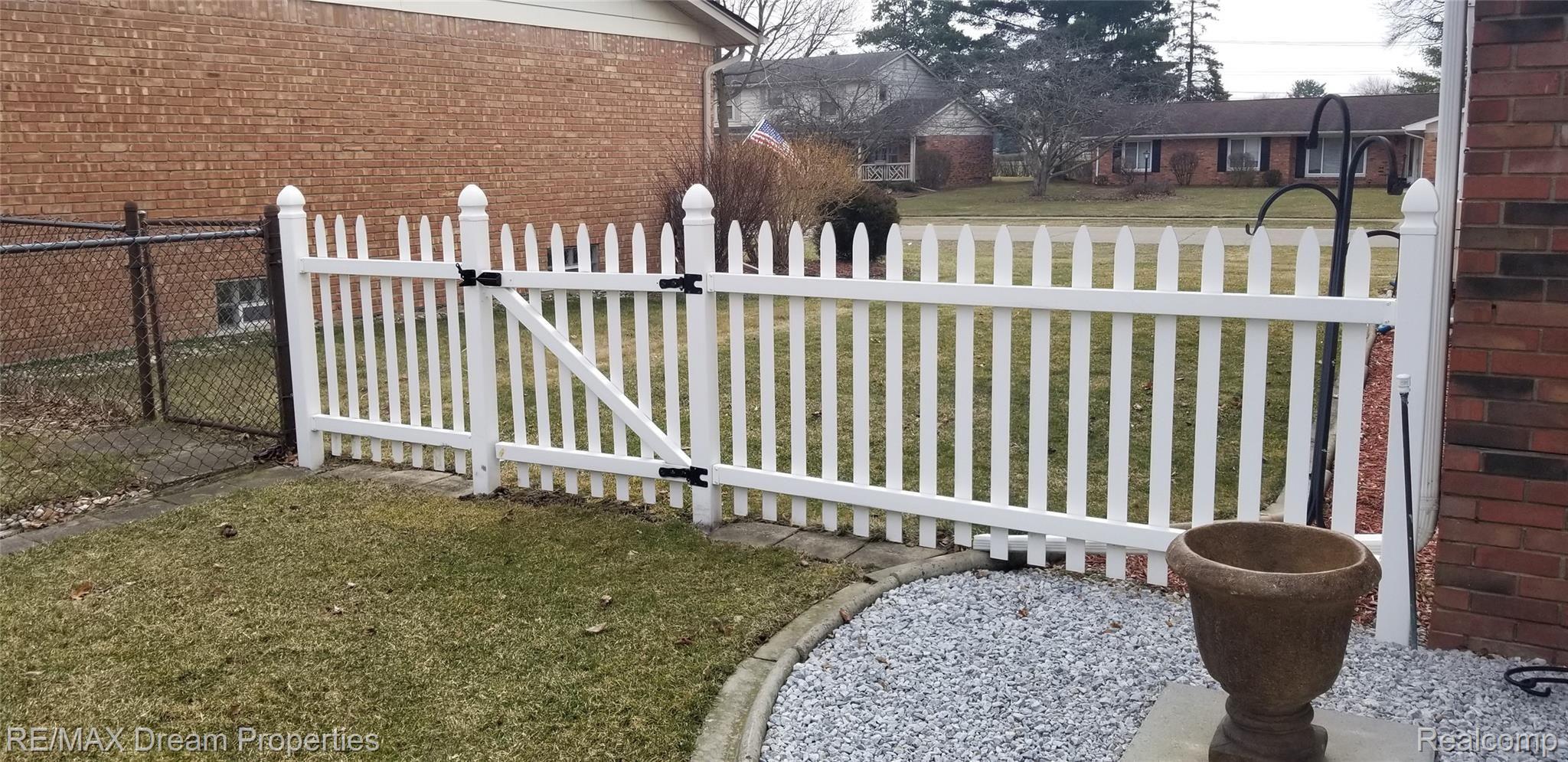 6533 Flintlock Ridge Utica, MI 48317 - Photo 41 of 53 GATED SIDE YARD ENTRY/EXIT