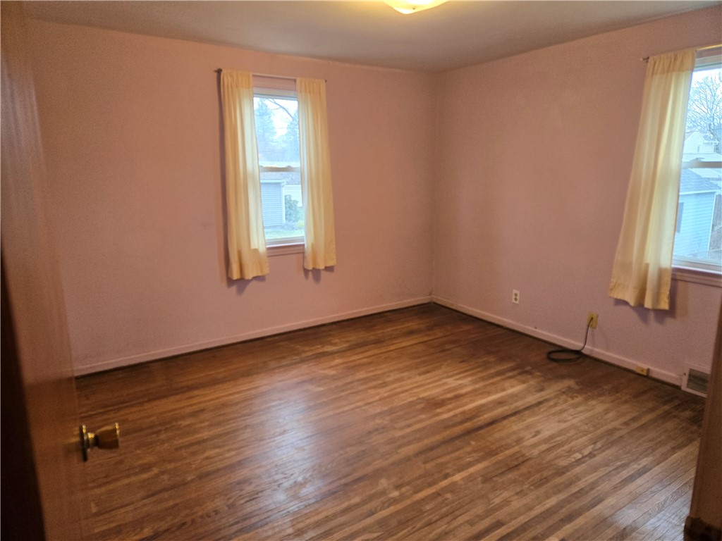 206 Haddon Road Greece, NY 14626 - Photo 9 of 18 Bedroom 1 with hardwood floors