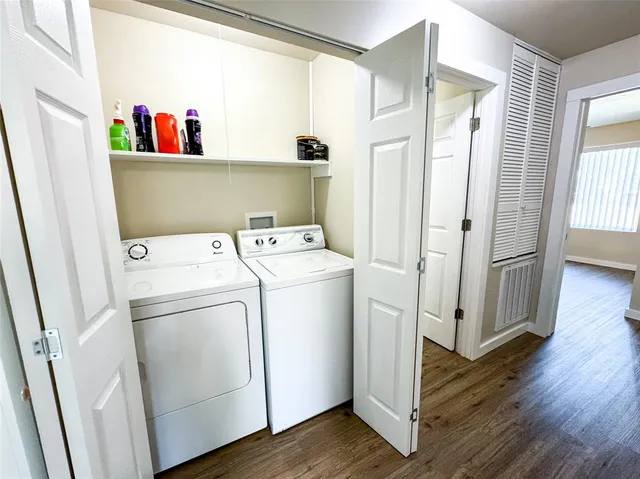 a utility room with dryer and washer