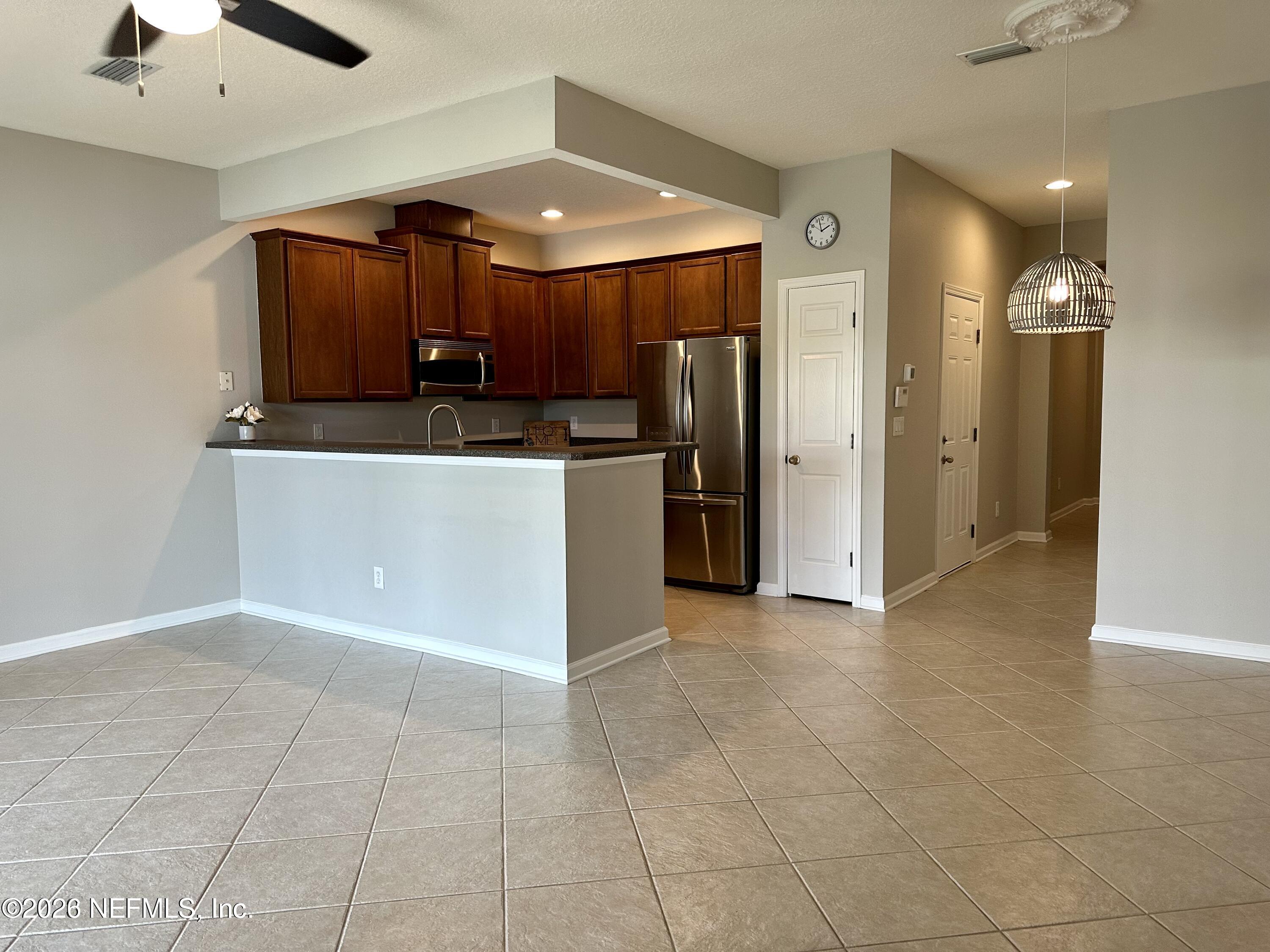 12946 Spring Rain Road Jacksonville, FL 32258 - Photo 11 of 25 LIVING ROOM