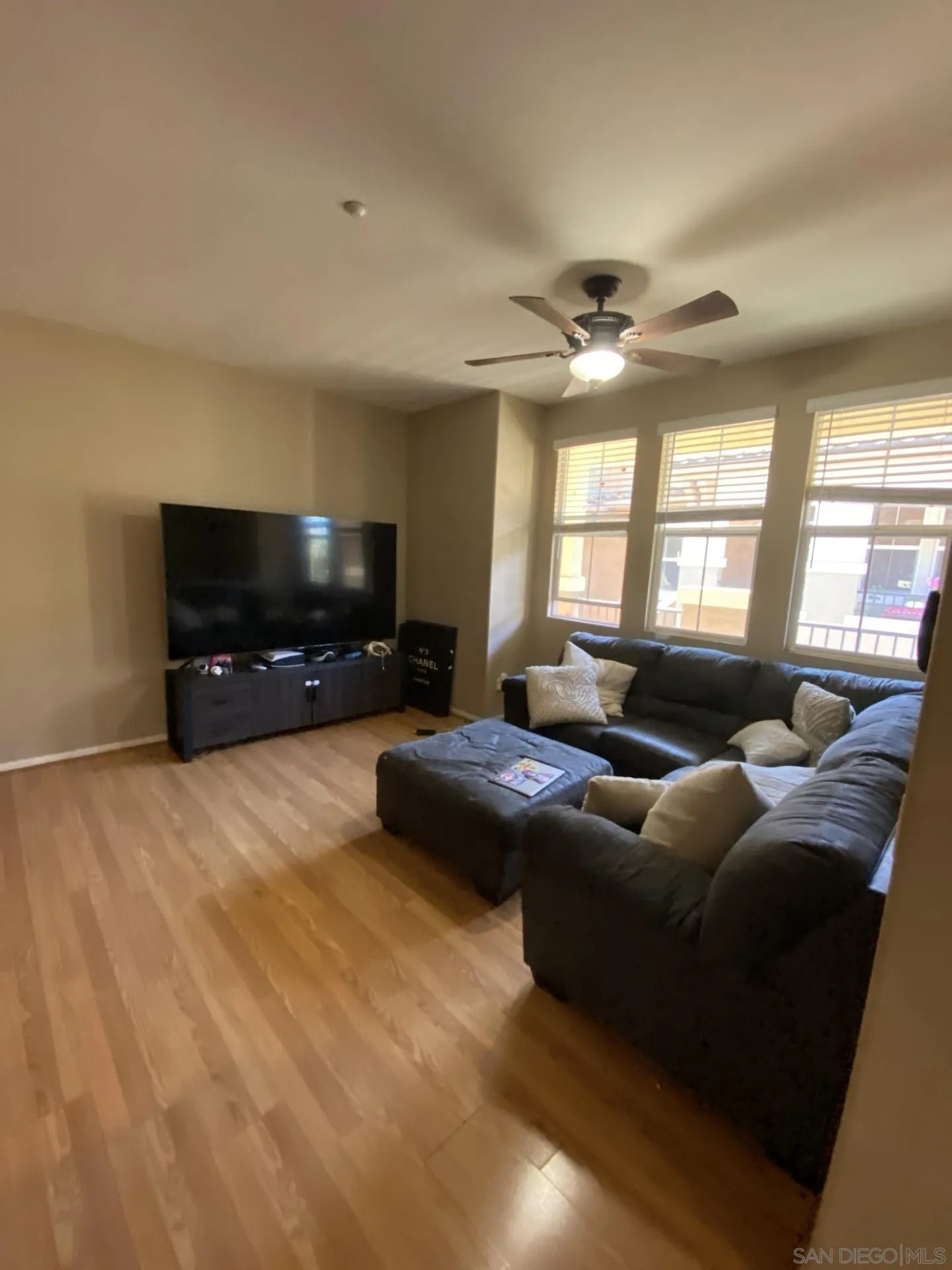 64 Via Sovana Santee, CA 92071 - Photo 2 of 15 a living room with furniture and a flat screen tv